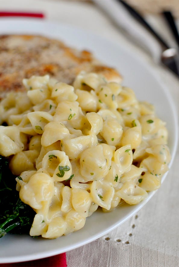 Creamy Garlic Shells is an easy pasta side dish. No store bought pouch required! | iowagirleats.com
