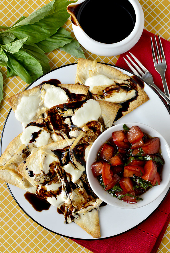 Caprese Chicken Nachos with Marinated Tomatoes and Balsamic Reduction | iowagirleats.com