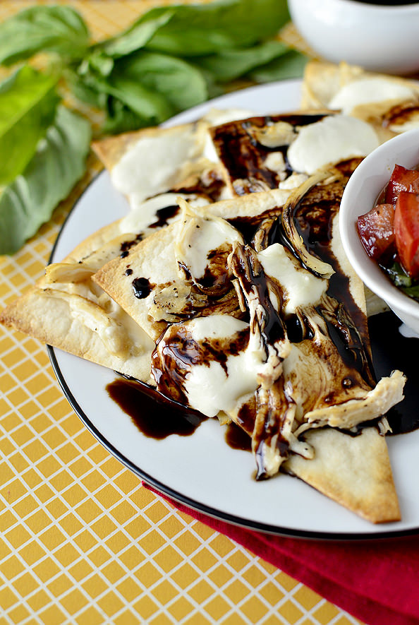 Caprese Chicken Nachos with Marinated Tomatoes and Balsamic Reduction | iowagirleats.com