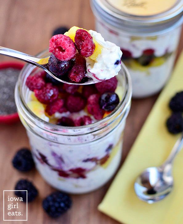 spoonful of a fruit and yogurt breakfast parfait