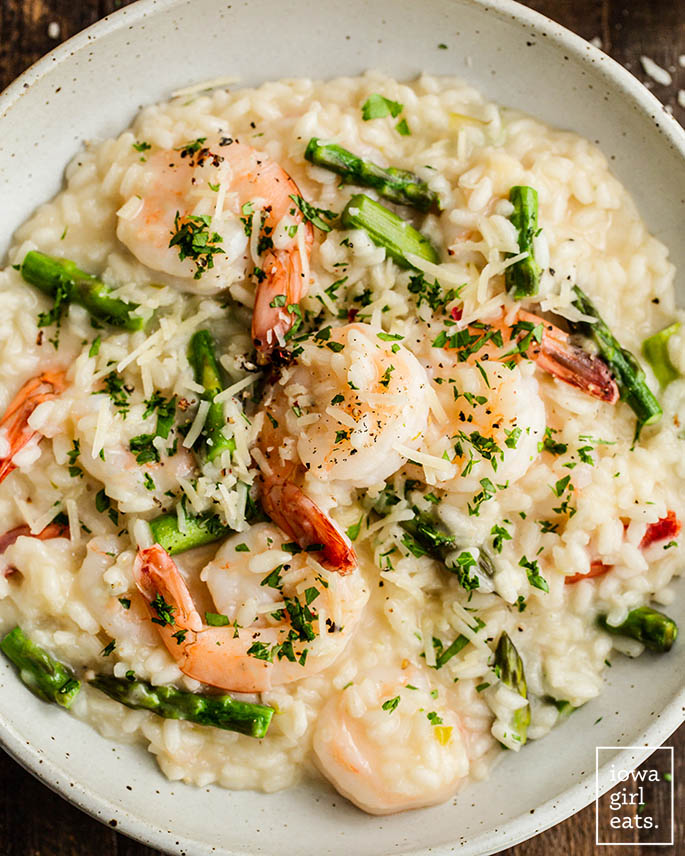 close up photo of a bowl of shrimp and asparagus risotto
