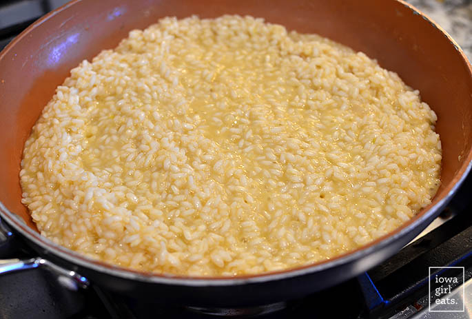 risotto cooking in a skillet