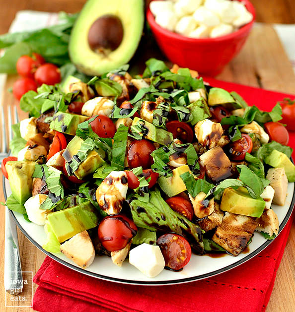 avocado and chicken caprese salad on a plate