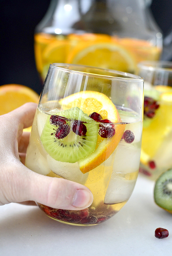 Champagne Sangria Punch. #wine #sangria #cocktail #holidays #girlsnight #champagne | Iowagirleats.com