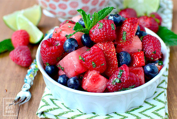mojito fruit salad in a serving bowl with fresh mint