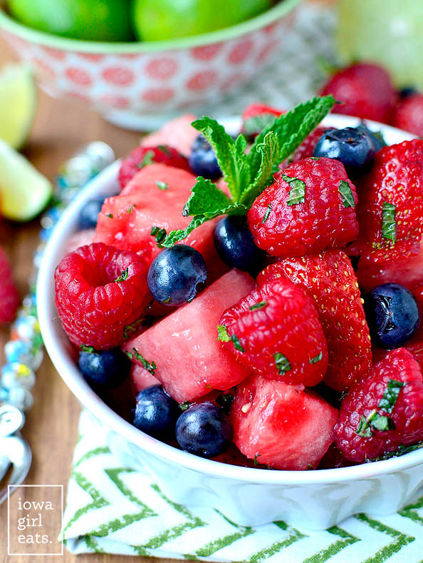 mojito fruit salad in a bowl with fresh mint