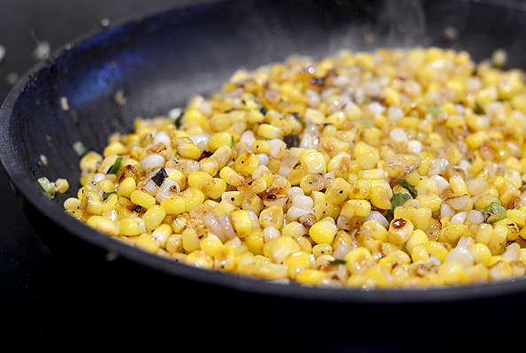 Sweet Corn with Bourbon-Maple Brown Butter and Bacon is a mouthwatering side dish bursting with layers of flavor! | iowagirleats.com