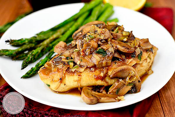 saucy leek and mushroom chicken on a plate