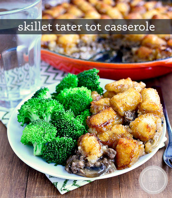 scoop of gluten free tater tot casserole on a plate with broccoli