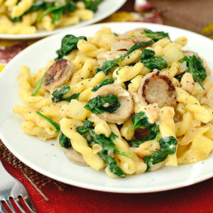 sweet apple chicken sausage pasta on a plate