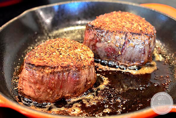 cooked filet mignon steaks in a skillet