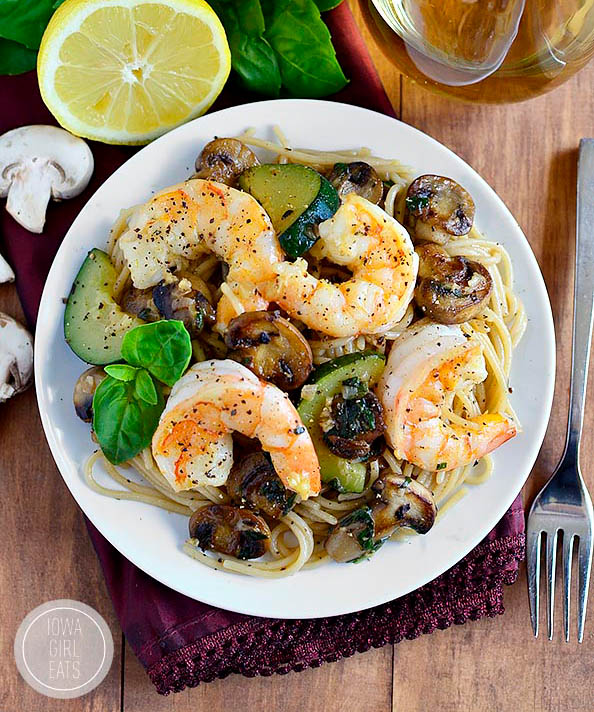 mushroom and zucchini shrimp pasta on a plate