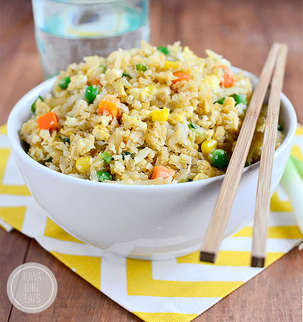 Bowl of fried rice with chop sticks