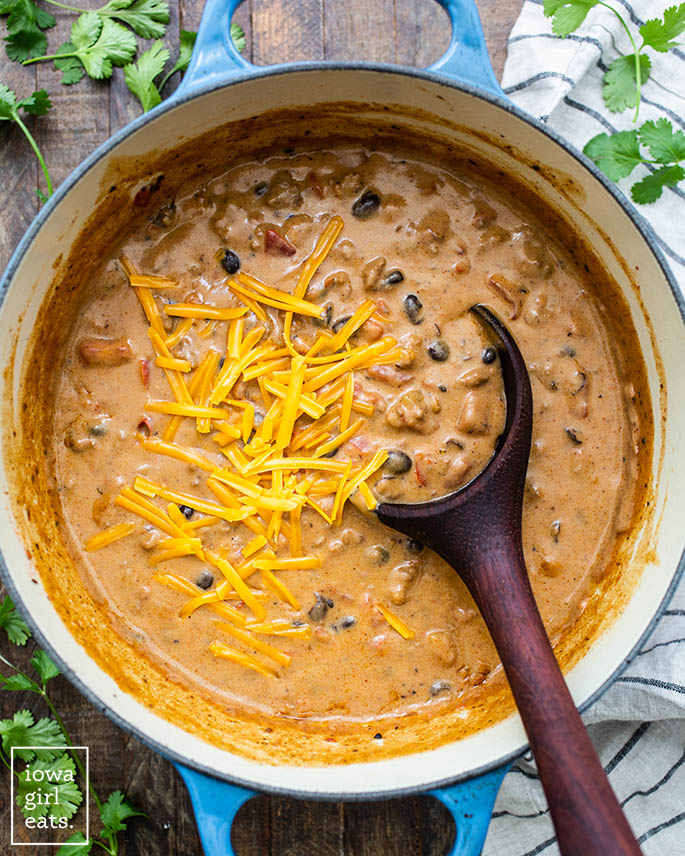 soup pot of cheesy taco soup with a spoon