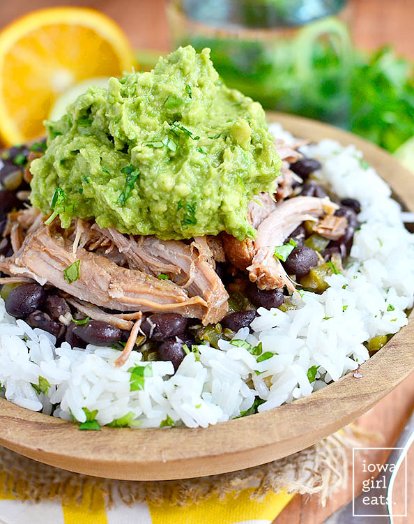 Bowl of Crock Pot Mojo Pork with beans and guacamole
