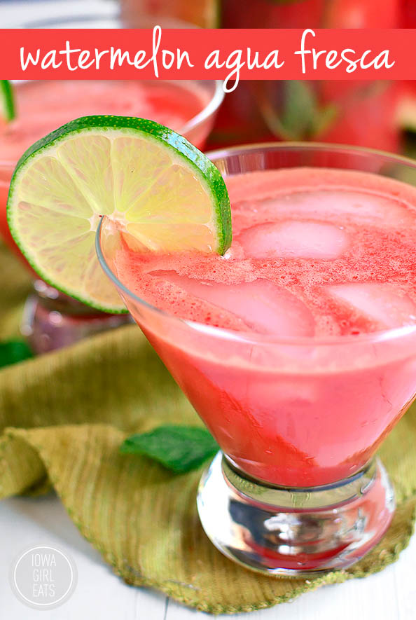 watermelon aqua fresca in a glass with a lime