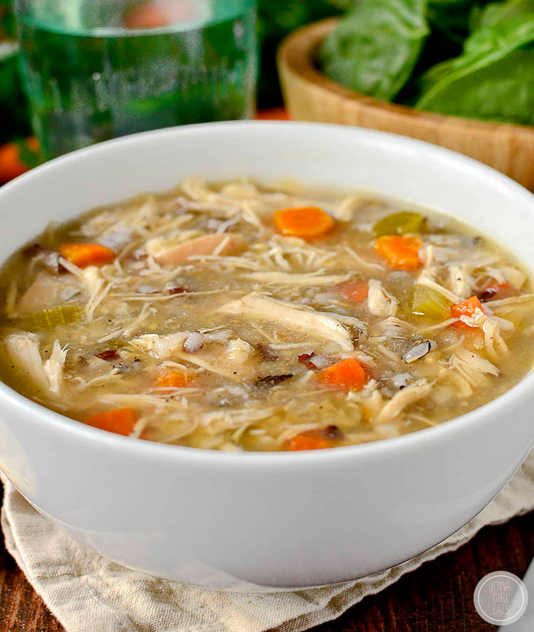 a bowl of crock pot chicken and wild rice soup