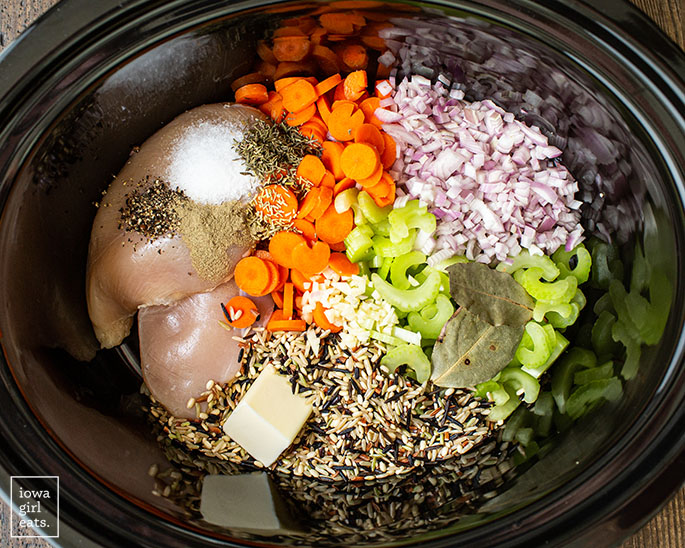 ingredients for crock pot chicken and wild rice soup in a crock pot