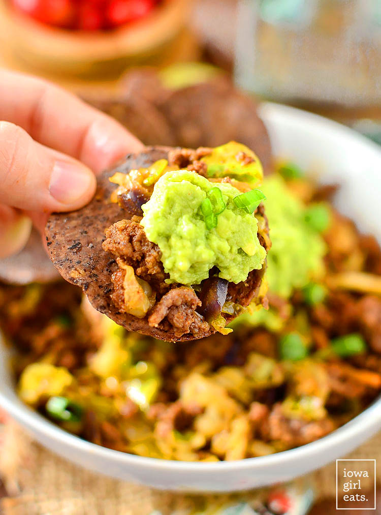 chip scooping up low carb beef taco bowls