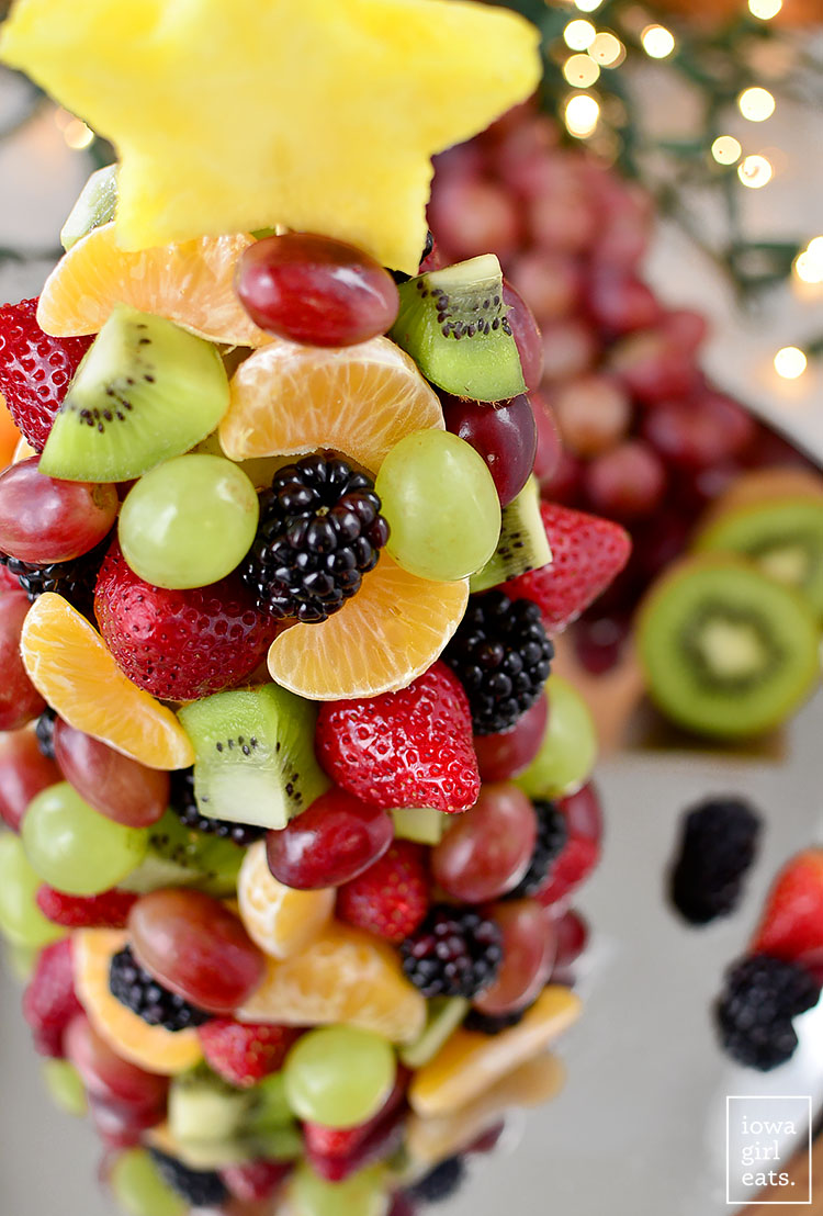 Start a new holiday tradition with a beautiful and fresh Fruit Christmas Tree! Perfect for parties, a dessert table centerpiece, or a healthy treat for Santa. | iowagirleats.com