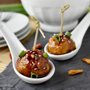 Kung Pao Chicken Meatballs are a little spicy, a little sweet, and the perfect game-day or party appetizer! | iowagirleats.com