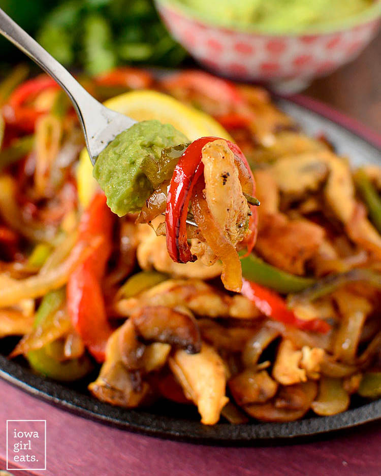forkful of chicken fajitas and vegetables