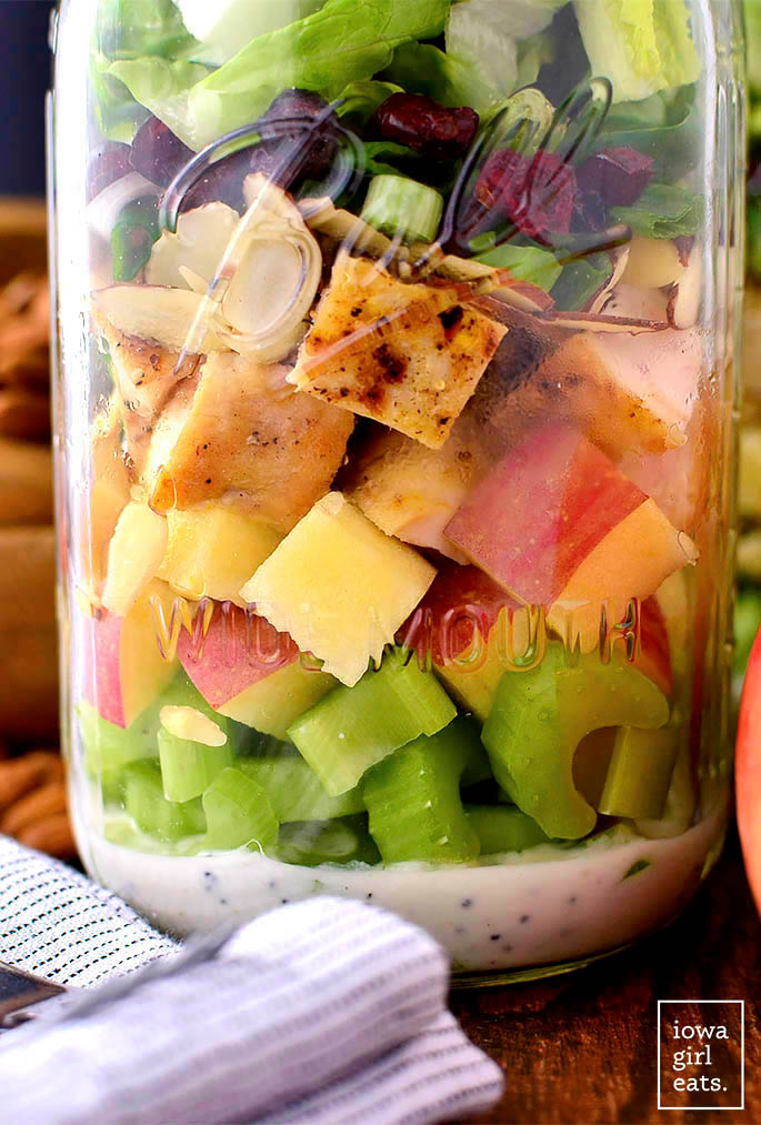 large layered salad in a mason jar