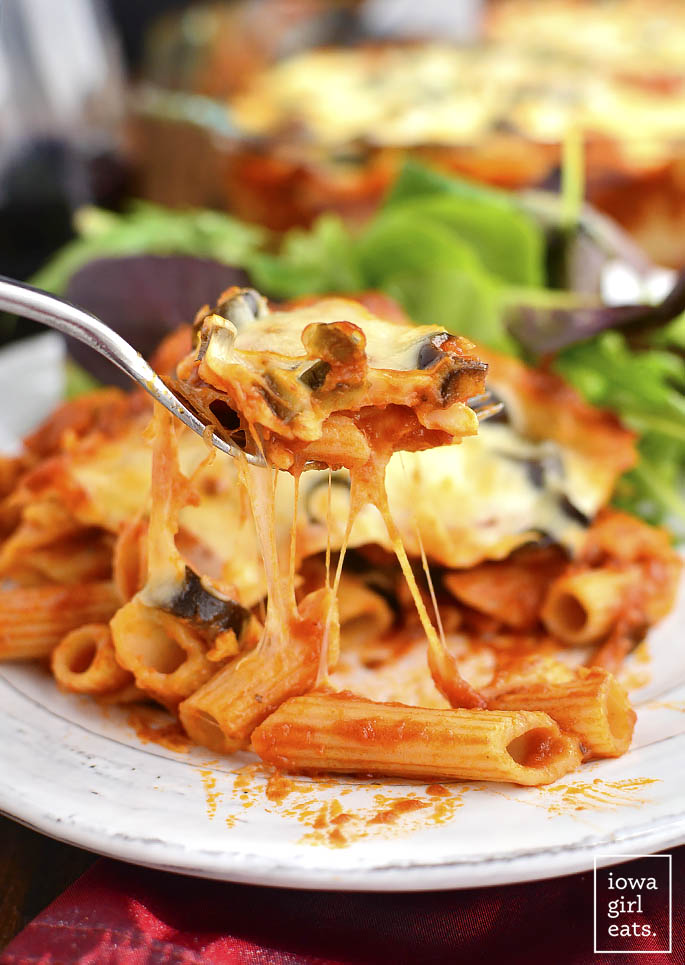 5-Ingredient Pizza Pasta Bake is a cheesy and decadent way to get your pizza fix. Simple and gluten-free! | iowagirleats.com