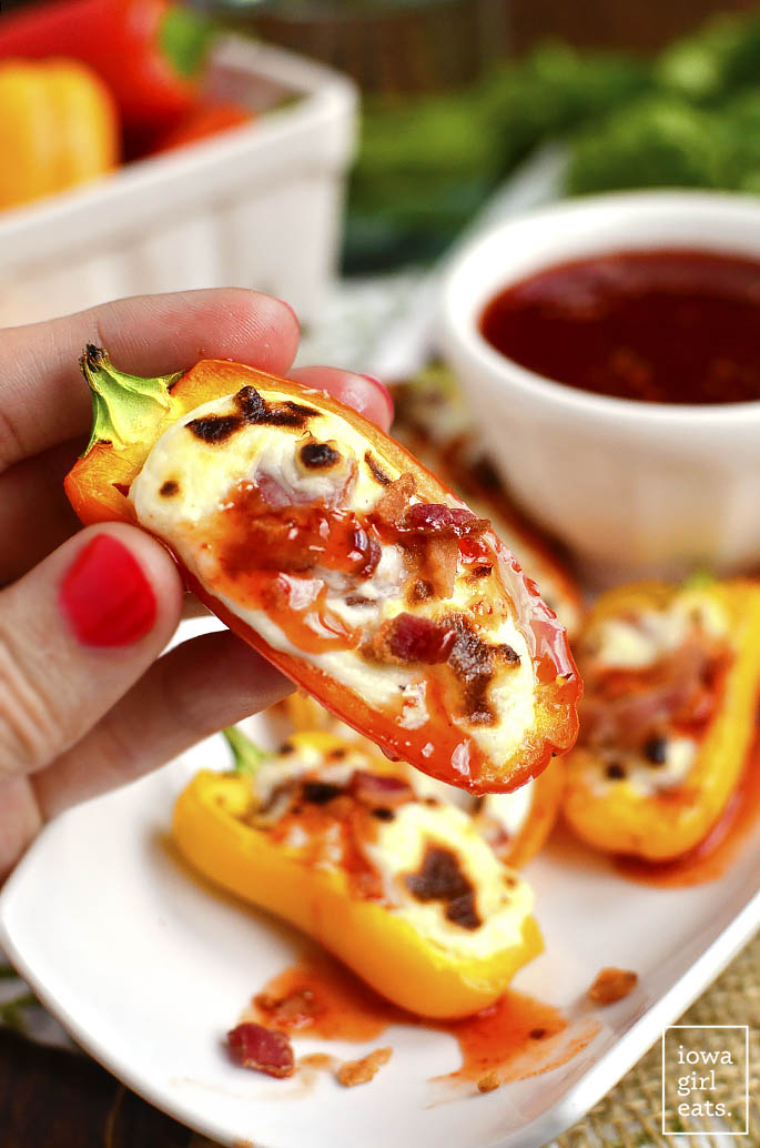 Bacon and Goat Cheese Stuffed Sweet Pepper Poppers are an addicting, gluten-free appetizer recipe. Less than 20 minutes to assemble and cook, and perfect for parties and get-togethers. | iowagirleats.com