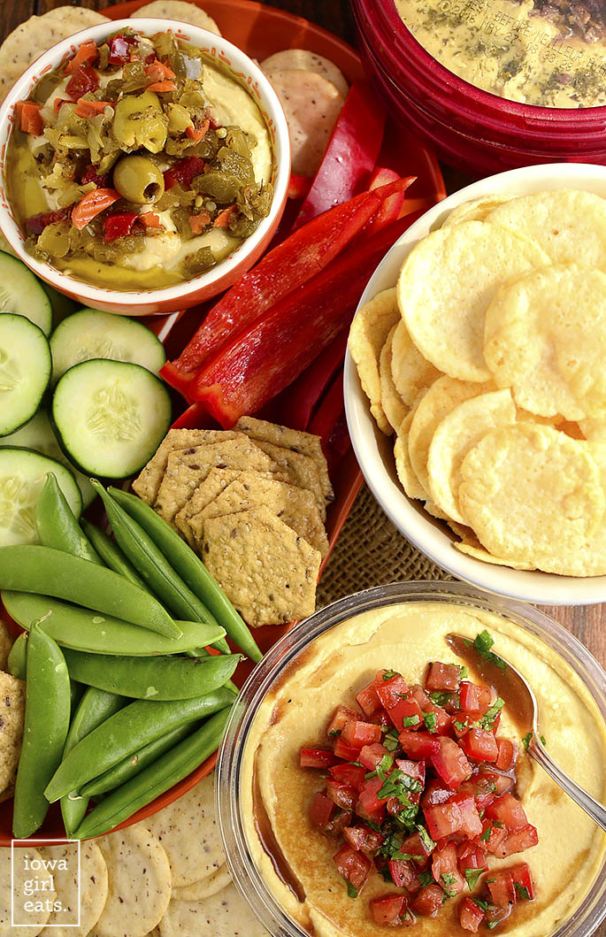 Shortcut Bruschetta Hummus is a quick and easy way to jazz up store-bought hummus. This fresh and healthy snack is absolutely delicious! | iowagirleats.com