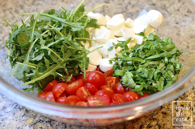 Caprese Pasta Salad is light and fresh - the perfect gluten-free spring and summer potluck or picnic salad! | iowagirleats.com