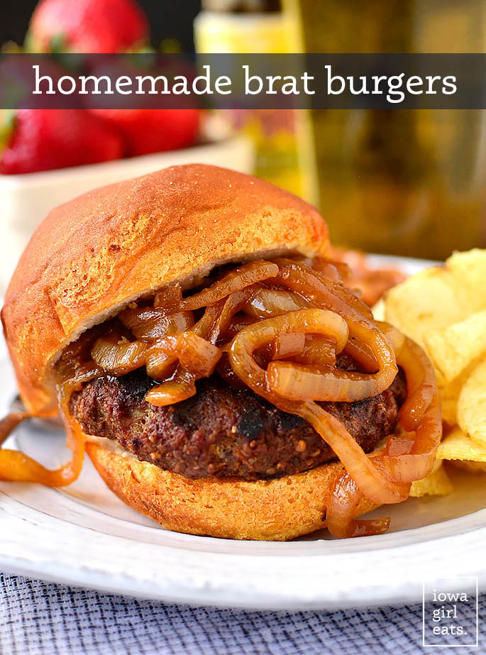 homemade brat burger on a bun with caramelized onions