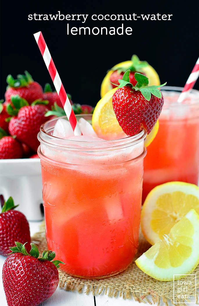 mason jar of strawberry lemonade with a straw