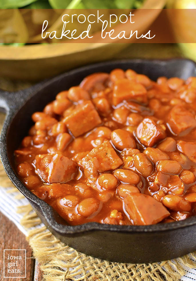 Crock Pot Baked Beans is a rich, sassy, and super simple crock pot recipe that's sure to become a summertime side dish staple at your house! | iowagirleats.com