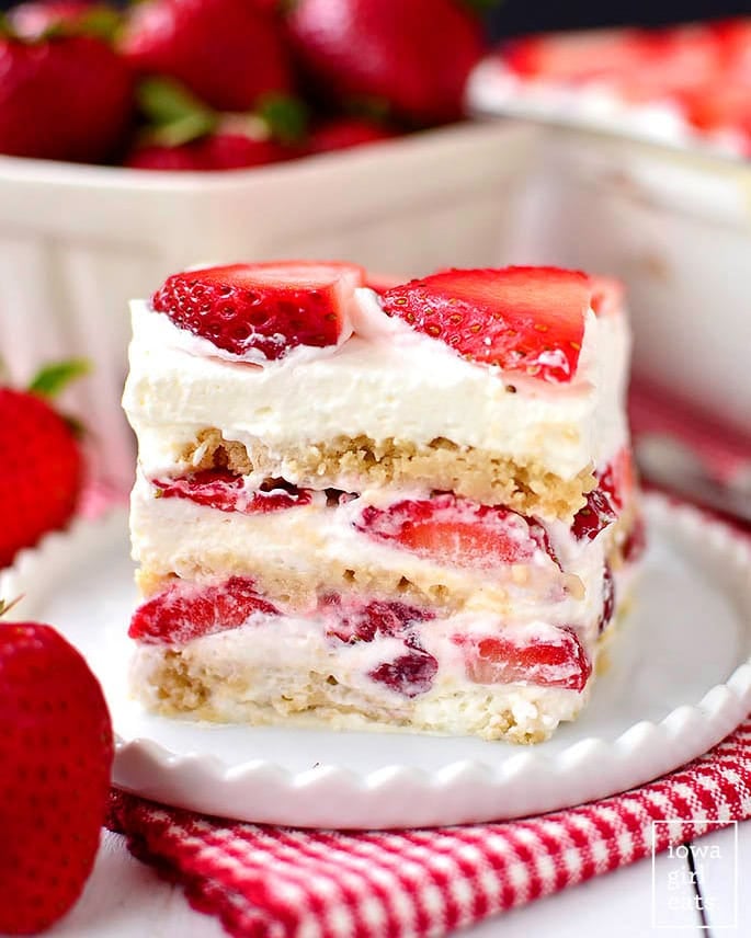 slice of strawberry shortcake icebox cake on a plate