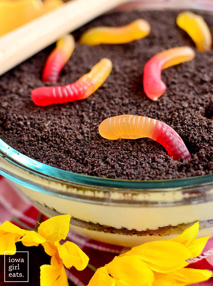 gluten free dirt cake in a serving bowl with gummy worms
