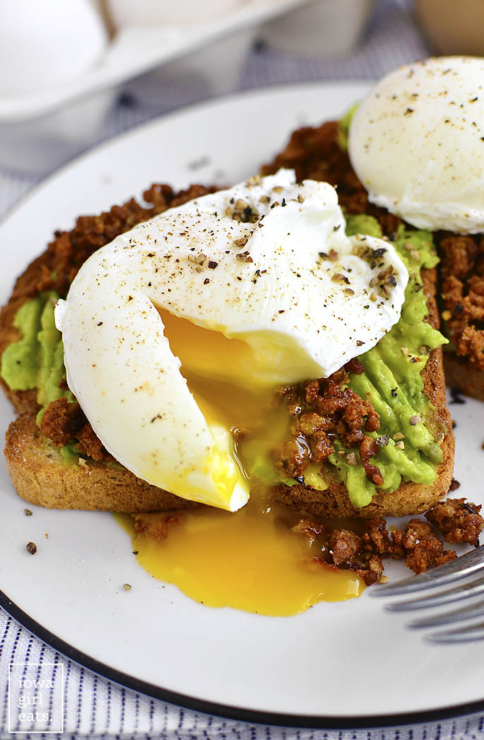 Egg and Chorizo Avocado Toasts are a healthy and filling way to start or end your day. These pumped up gluten-free avocado toasts are absolutely delicious! | iowagirleats.com
