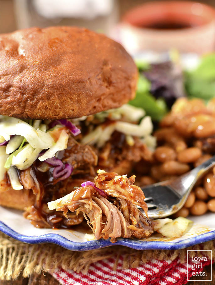 Crock Pot BBQ Pulled Pork is a long cooking crock pot recipe that couldn't be simpler. Use the pulled pork in sandwiches, or for nachos, salads, and wraps! #glutenfree | iowagirleats.com