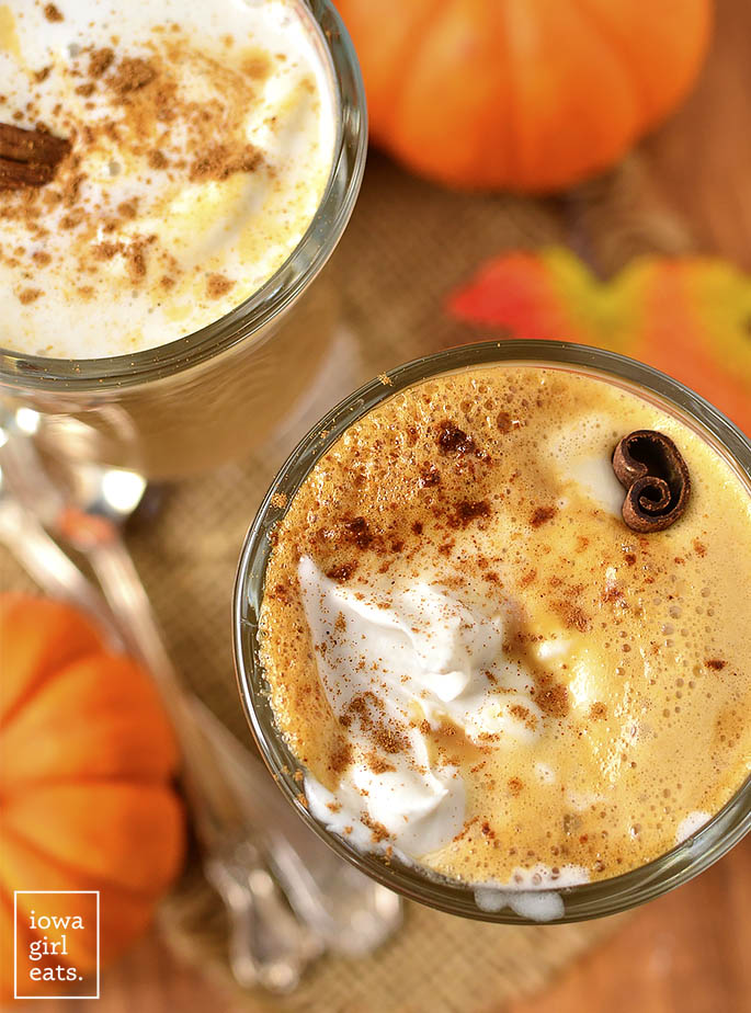 Save money and calories by making your own Pumpkin Spice Latte at home in 5 minutes or less! Use espresso, strong coffee, or keep it caffeine-free for a festive, kid-friendly drink. | iowagirleats.com