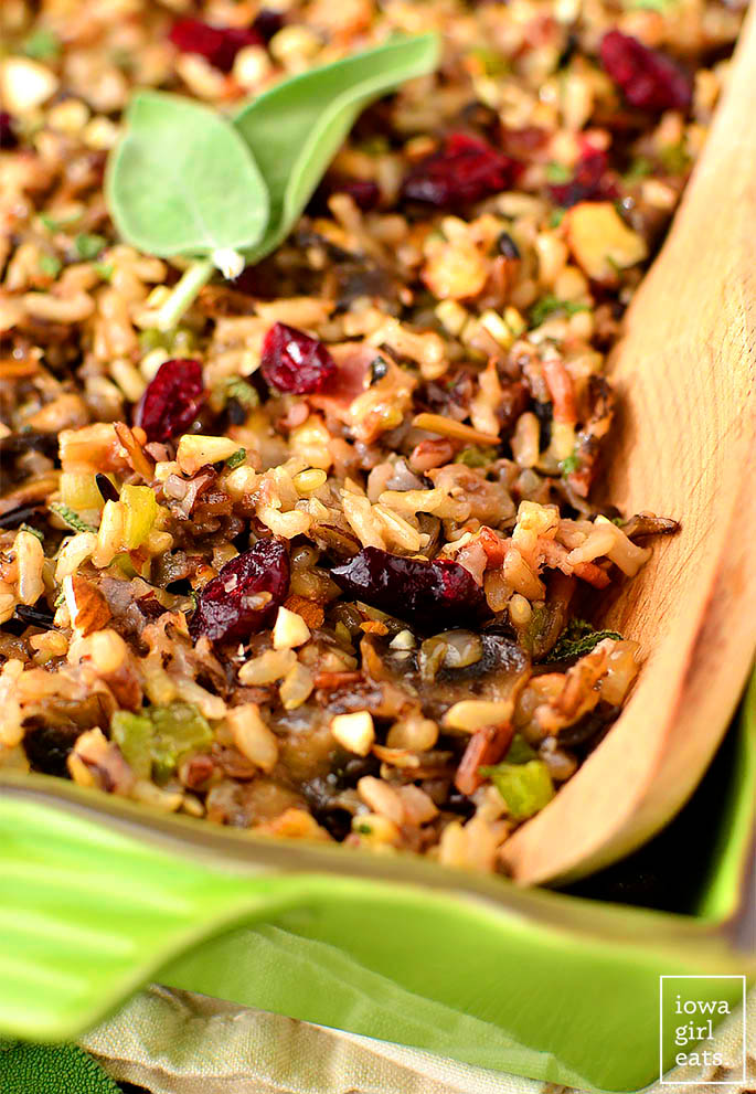 serving spoon scooping wild rice stuffing