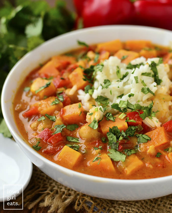 Senegalese Soup is chock-full of sweet potatoes, chickpeas, warming curry and coconut milk. A healthy, gluten-free soup recipe that's delicious and filling! | iowagirleats.com