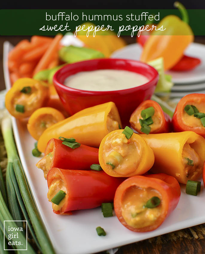 Buffalo Hummus Stuffed Sweet Pepper Poppers are a healthy, gluten-free appetizer to include in your next party or tailgating spread. Fun and poppable! | iowagirleats.com