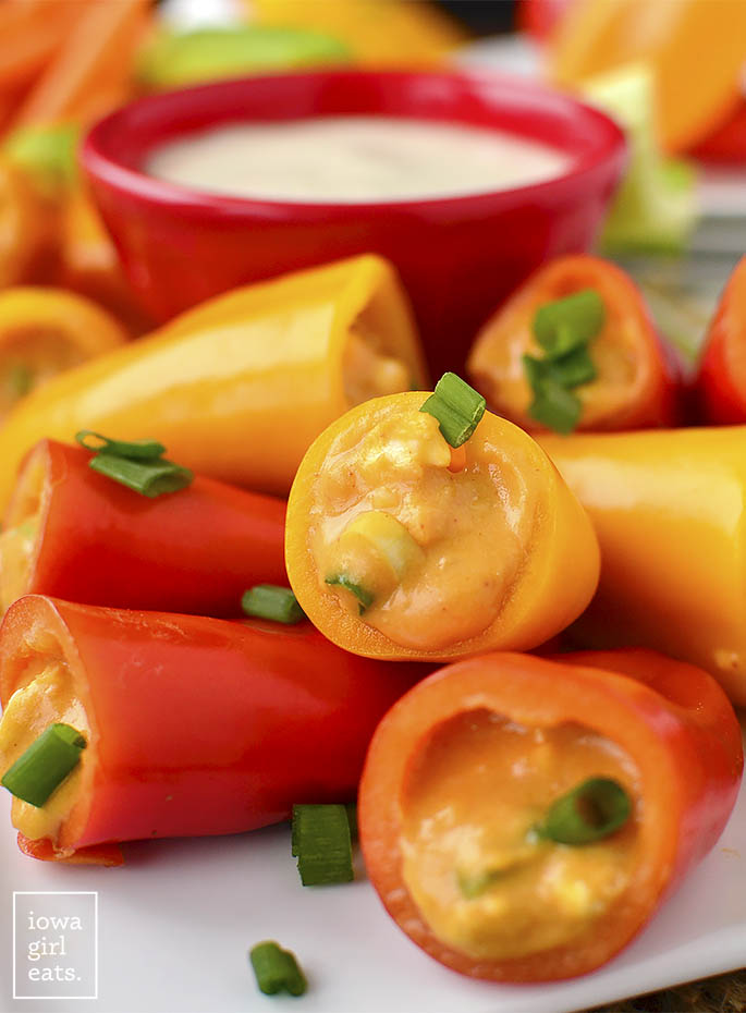 Buffalo Hummus Stuffed Sweet Pepper Poppers are a healthy, gluten-free appetizer to include in your next party or tailgating spread. Fun and poppable! | iowagirleats.com