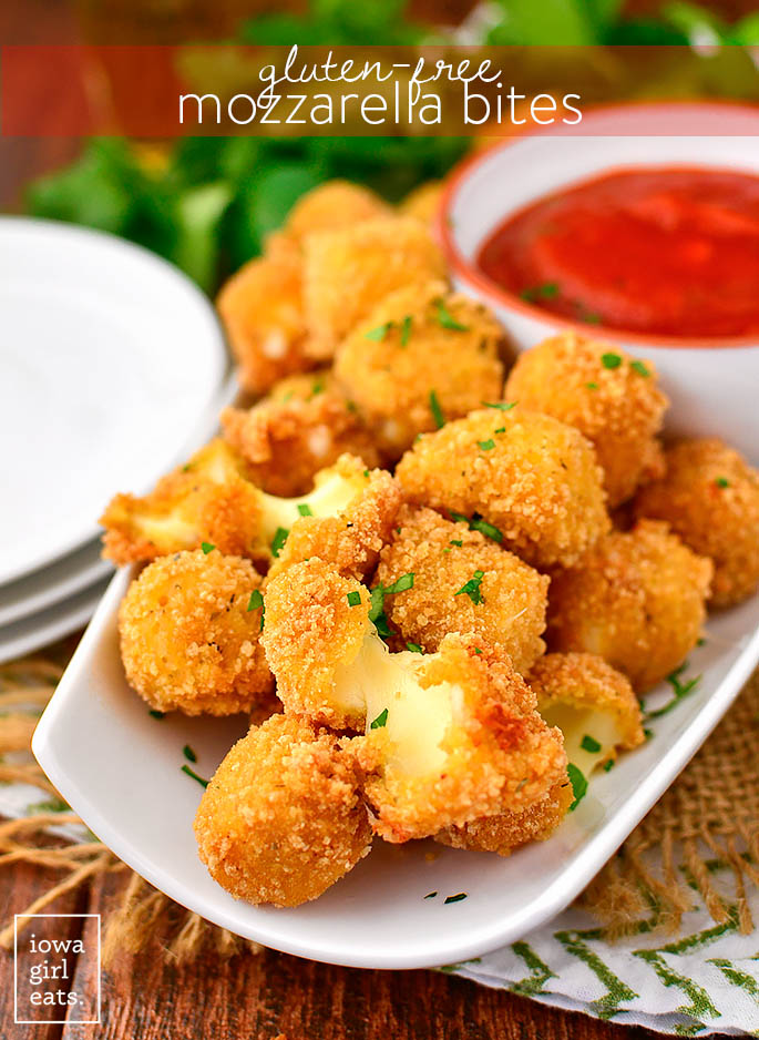 gluten free mozzarella bites on a platter with dipping sauce