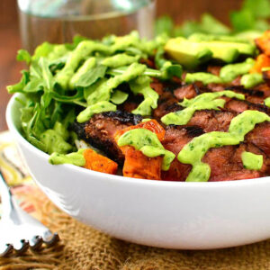 steak and sweet potato bowls with avocado drizzle