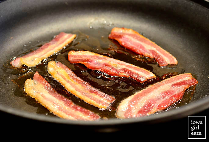 bacon browning in a skillet