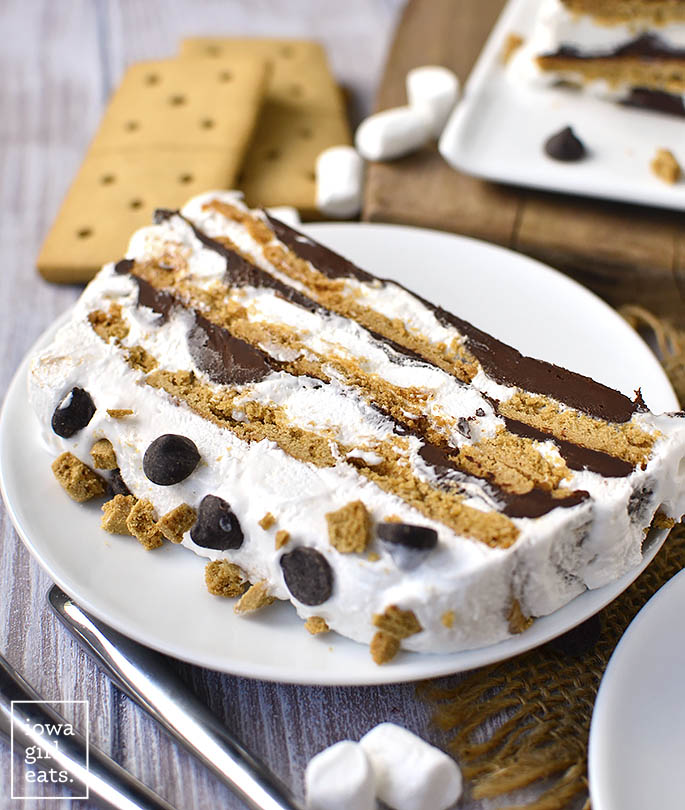 No-Bake S'mores Icebox Cake is a gluten-free and dairy-free dessert recipe that will be a hit with kids and adults alike. Sticky and sweet, just like the real thing! | iowagirleats.com