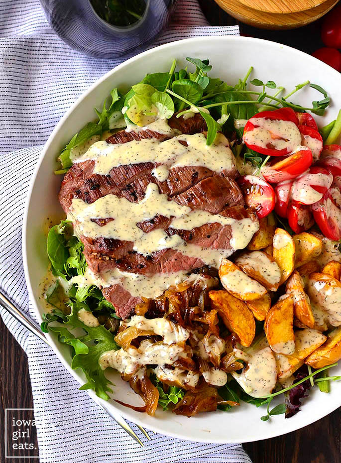 overhead photo of steak and potatoes on a salad