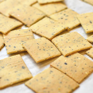 Everything Bagel Seasoning Almond Crackers are gluten-free and high in protein. These 3 ingredient, crunchy crackers are perfect to dunk into your favorite dips with! | iowagirleats.com
