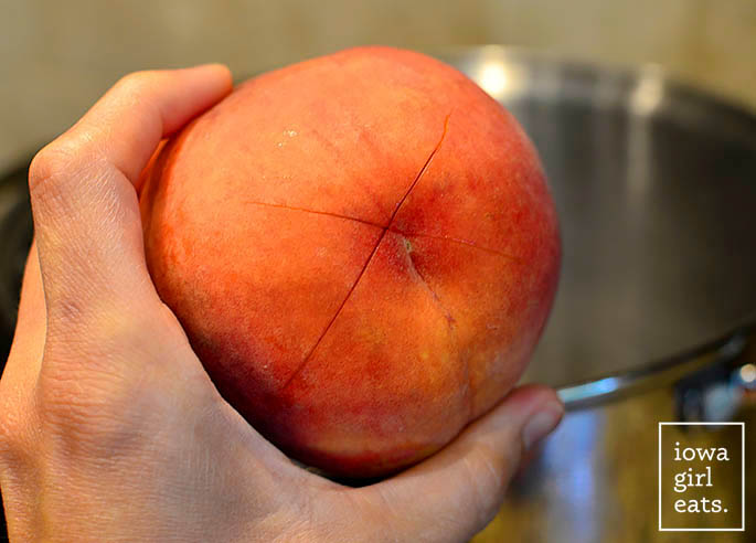 fresh peach with an x on the bottom